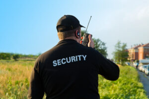 Security guard providing eyewitness account of a crime. to verify an activated alarm.